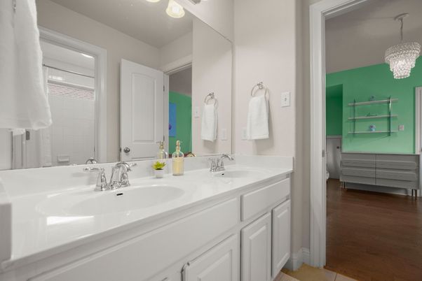 Bathroom, Chandelier, Dual Sink Vanities, Interior, Wood Texture Flooring