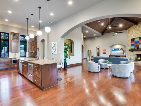 Fireplace, Interior, Kitchen, Living room, Pendant Lights, Recessed Lighting, Stainless Steel Appliances, Stone Walls, Wooden Beams, Wooden Ceilings, Wood Texture Flooring