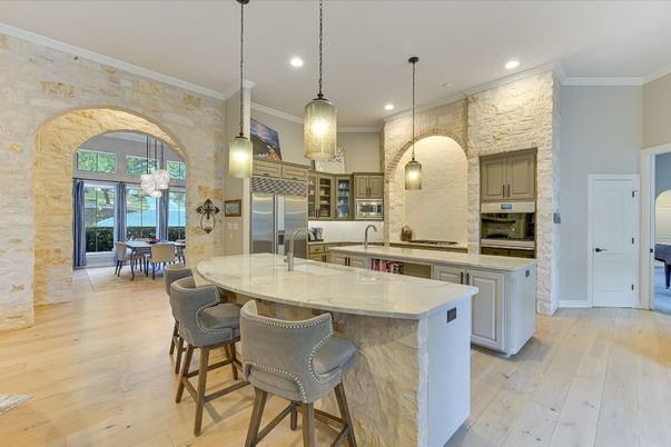Dining room, Interior, Kitchen, Pendant Lights, Recessed Lighting, Stainless Steel Appliances, Stone Walls, Wood Texture Flooring
