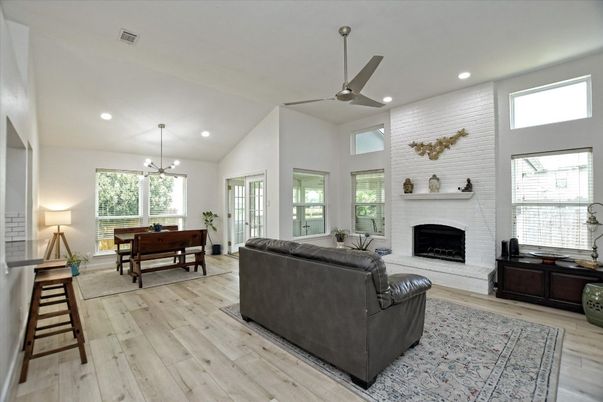 Dining room, Fireplace, Interior, Living room, Recessed Lighting, Wood Texture Flooring