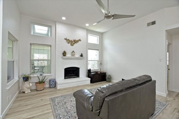 Fireplace, Interior, Living room, Recessed Lighting, Wood Texture Flooring