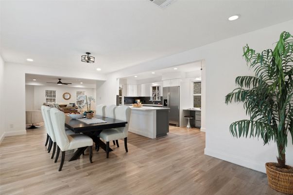 Dining room, Interior, Kitchen, Pendant Lights, Recessed Lighting, Stainless Steel Appliances, Wood Texture Flooring
