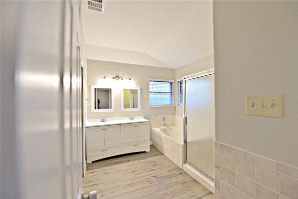 Bathroom, Dual Sink Vanities, Glass Shower, Interior, Wood Texture Flooring