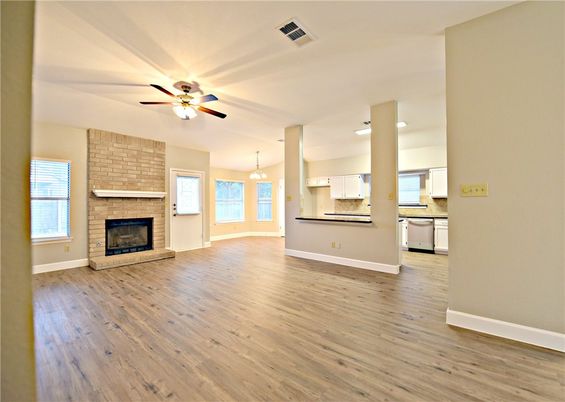 Empty room, Fireplace, Interior, Kitchen, Pendant Lights, Stone Walls, Wood Texture Flooring