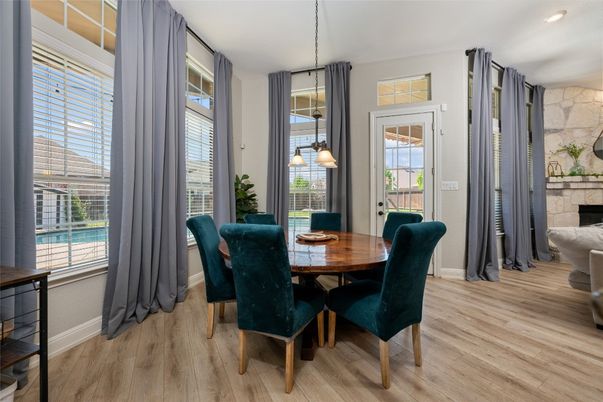Dining room, Fireplace, Interior, Pendant Lights, Recessed Lighting, Wood Texture Flooring