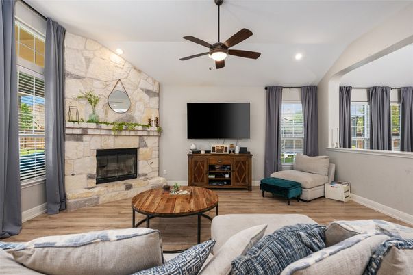 Fireplace, Interior, Living room, Recessed Lighting, Stone Walls, Wood Texture Flooring