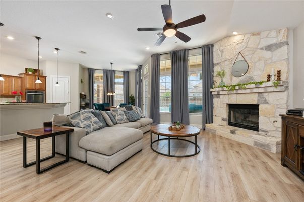 Fireplace, Interior, Kitchen, Living room, Pendant Lights, Recessed Lighting, Stone Walls, Wood Texture Flooring