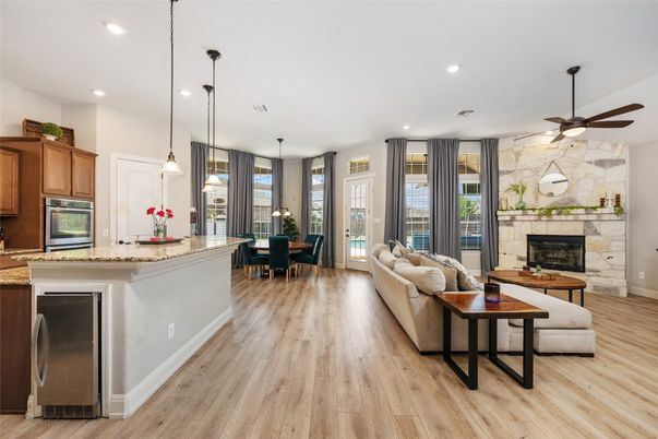 Dining room, Fireplace, Interior, Kitchen, Living room, Pendant Lights, Recessed Lighting, Stone Walls, Wood Texture Flooring
