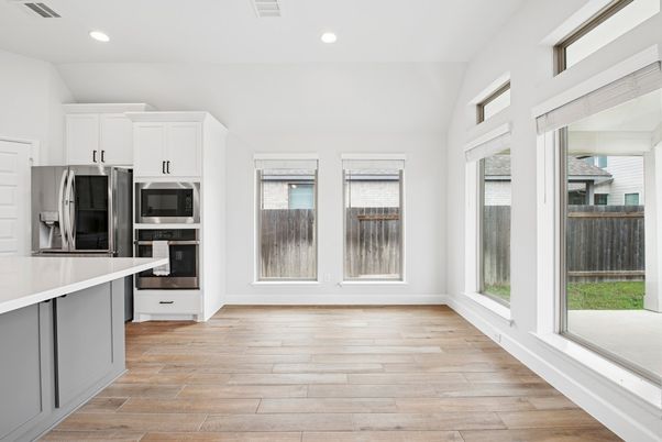 Interior, Kitchen, Recessed Lighting, Stainless Steel Appliances, Wood Texture Flooring