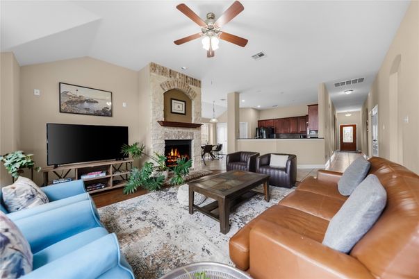 Fireplace, Interior, Kitchen, Living room, Recessed Lighting, Stone Walls, Wood Texture Flooring