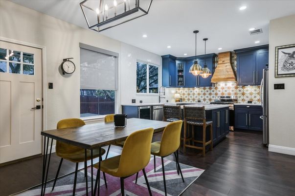 Dining room, Interior, Kitchen, Pendant Lights, Recessed Lighting, Stainless Steel Appliances, Wood Texture Flooring