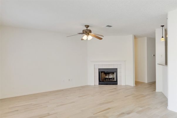 Empty room, Fireplace, Interior, Pendant Lights, Wood Texture Flooring