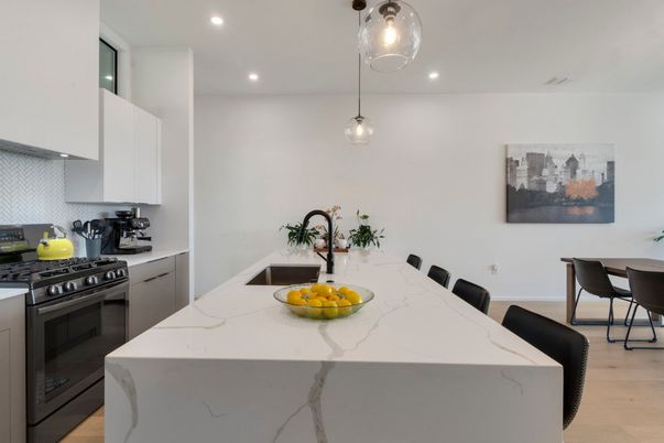 Dining room, Interior, Kitchen, Pendant Lights, Recessed Lighting, Stainless Steel Appliances, Wood Texture Flooring