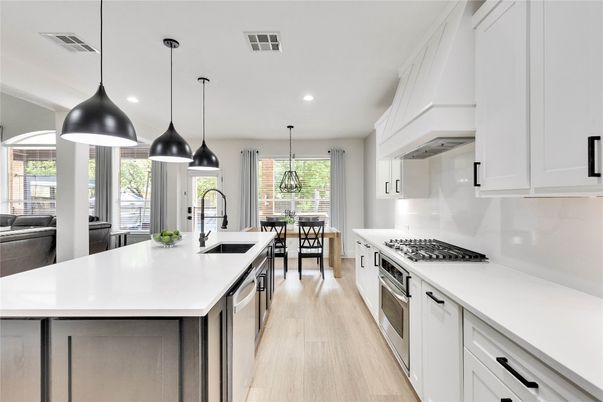 Dining room, Interior, Kitchen, Pendant Lights, Recessed Lighting, Stainless Steel Appliances, Wood Texture Flooring