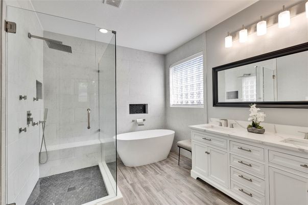 Bathroom, Dual Sink Vanities, Free Standing Baths, Glass Shower, Interior, Recessed Lighting, Wood Texture Flooring