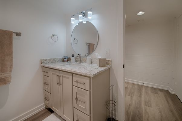 Bathroom, Dual Sink Vanities, Interior, Recessed Lighting, Wood Texture Flooring