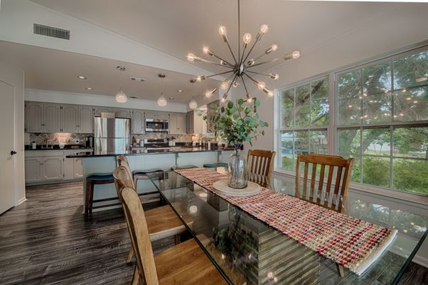 Dining room, Interior, Kitchen, Pendant Lights, Recessed Lighting, Stainless Steel Appliances, Wood Texture Flooring