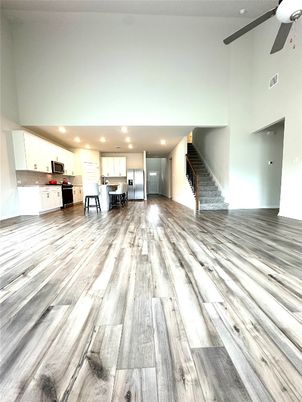 Interior, Kitchen, Recessed Lighting, Stainless Steel Appliances, Wood Texture Flooring