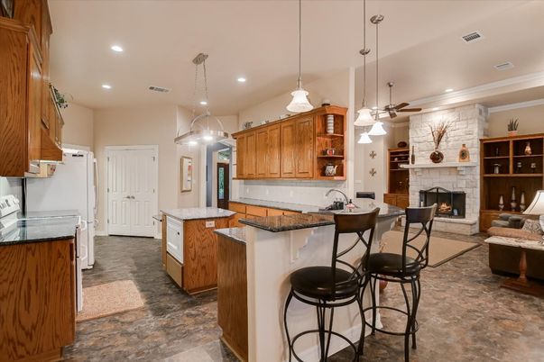 Fireplace, Interior, Kitchen, Living room, Pendant Lights, Recessed Lighting, Stone Walls