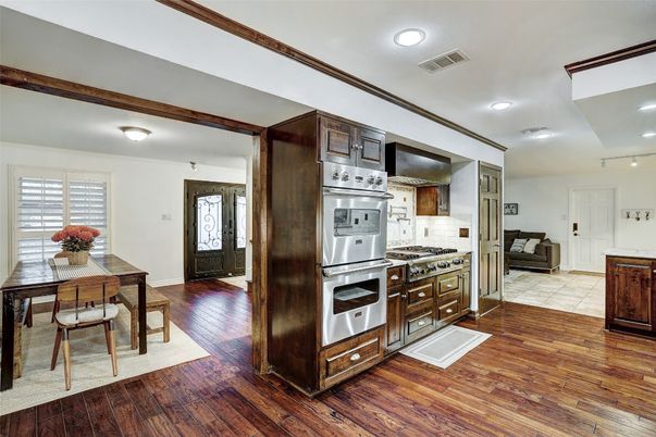 Dining room, Interior, Kitchen, Recessed Lighting, Stainless Steel Appliances, Wood Texture Flooring