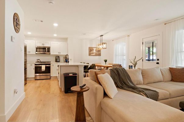 Dining room, Interior, Kitchen, Living room, Pendant Lights, Recessed Lighting, Stainless Steel Appliances, Wood Texture Flooring