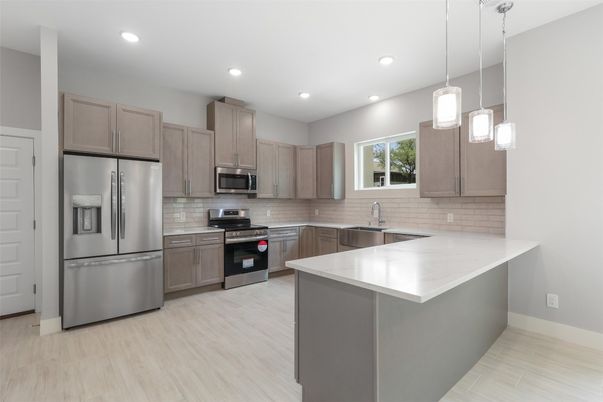 Interior, Kitchen, Pendant Lights, Recessed Lighting, Stainless Steel Appliances, Wood Texture Flooring