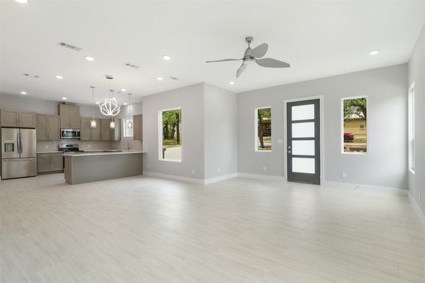 Chandelier, Empty room, Interior, Kitchen, Recessed Lighting, Stainless Steel Appliances, Wood Texture Flooring