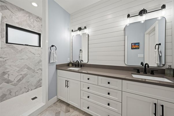Bathroom, Dual Sink Vanities, Interior, Marble, Marble Walls, Recessed Lighting