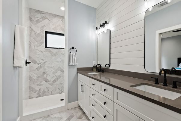 Bathroom, Dual Sink Vanities, Interior, Marble, Marble Walls, Recessed Lighting