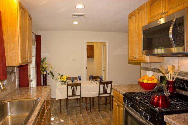Dining room, Interior, Kitchen, Recessed Lighting, Stainless Steel Appliances, Wood Texture Flooring