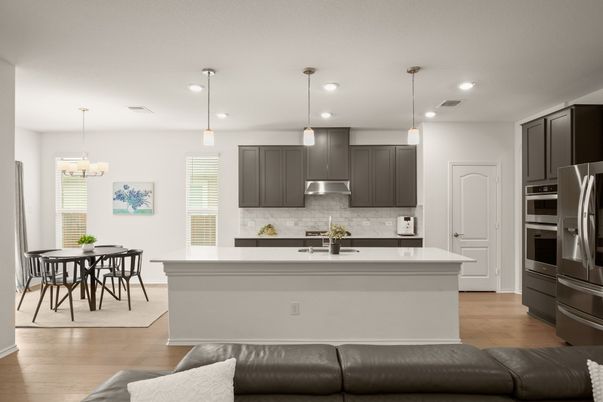 Chandelier, Dining room, Interior, Kitchen, Pendant Lights, Recessed Lighting, Stainless Steel Appliances, Wood Texture Flooring