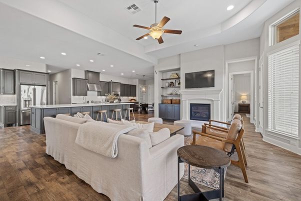Fireplace, Interior, Kitchen, Living room, Pendant Lights, Recessed Lighting, Stainless Steel Appliances, Wood Texture Flooring