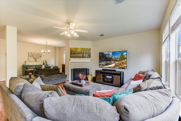 Chandelier, Fireplace, Interior, Living room