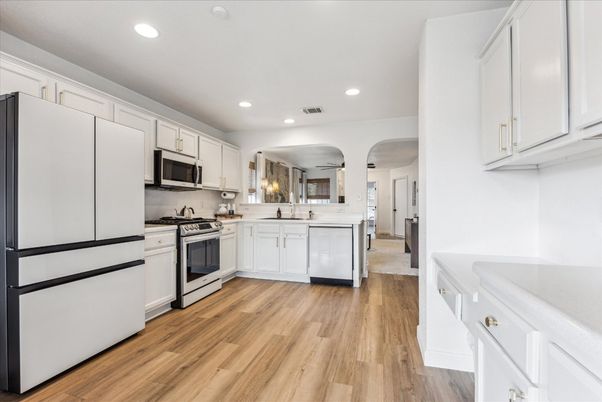 Interior, Kitchen, Recessed Lighting, Stainless Steel Appliances, Wood Texture Flooring