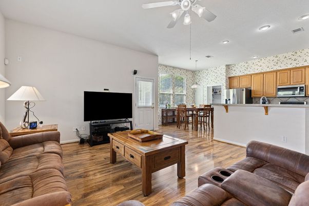 Dining room, Interior, Kitchen, Living room, Pendant Lights, Recessed Lighting, Stainless Steel Appliances, Wood Texture Flooring