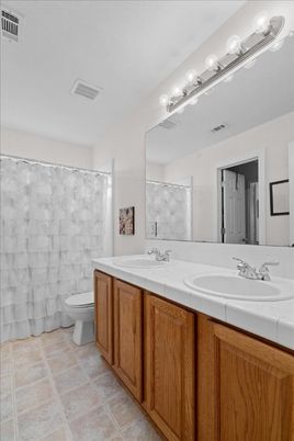 Bathroom, Dual Sink Vanities, Interior, Tile Countertops