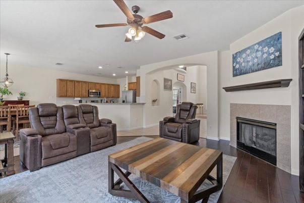 Dining room, Fireplace, Interior, Kitchen, Living room, Pendant Lights, Recessed Lighting, Stainless Steel Appliances, Wood Texture Flooring