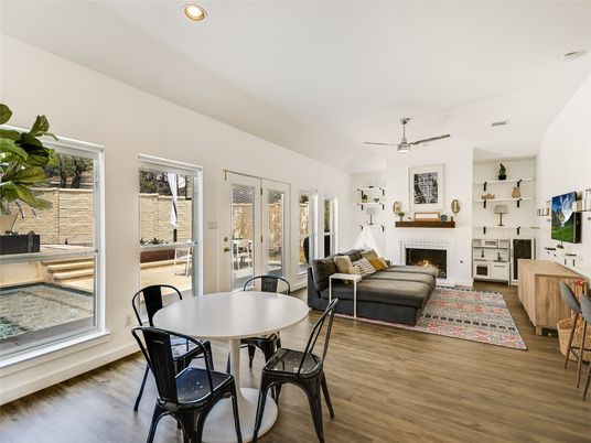 Dining room, Fireplace, Interior, Living room, Recessed Lighting, Wood Texture Flooring