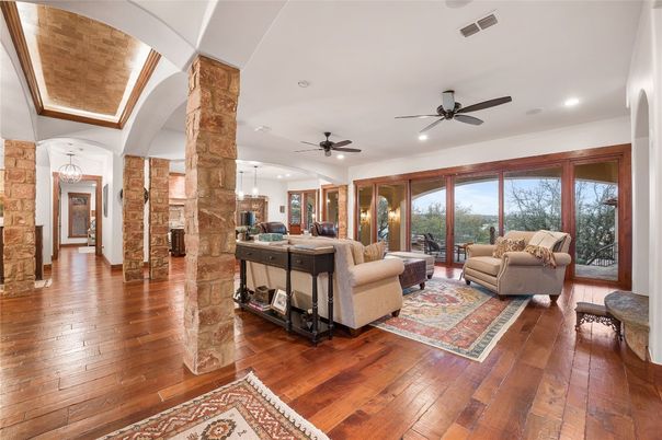 Fireplace, Interior, Living room, Pendant Lights, Recessed Lighting, Stone Walls, Wood Texture Flooring