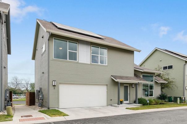 Attached, Exterior, Facade, Solar Panels, Rowhouse