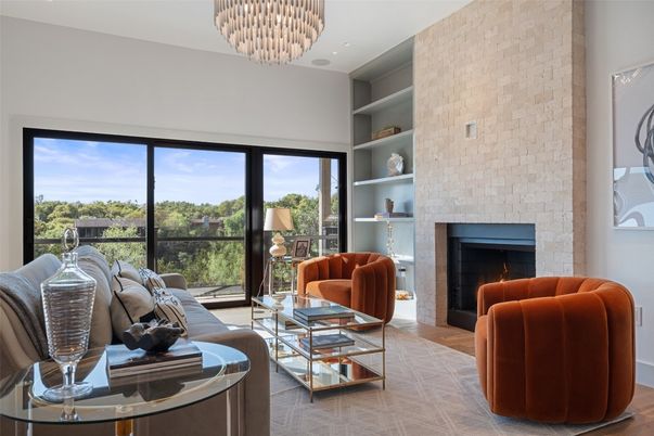 Chandelier, Fireplace, Interior, Living room, Recessed Lighting, Stone Walls, Wood Texture Flooring