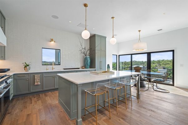 Dining room, Interior, Kitchen, Pendant Lights, Recessed Lighting, Stainless Steel Appliances, Wood Texture Flooring
