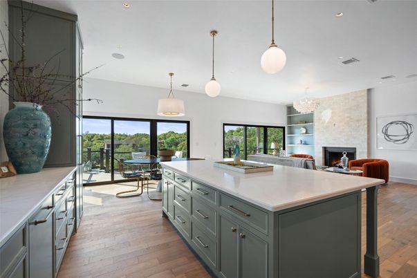 Chandelier, Dining room, Fireplace, Interior, Kitchen, Living room, Pendant Lights, Recessed Lighting, Wood Texture Flooring