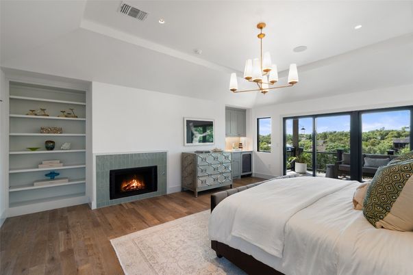 Bedroom, Chandelier, Fireplace, Interior, Recessed Lighting, Wood Texture Flooring