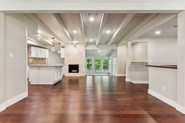 Empty room, Fireplace, Interior, Kitchen, Pendant Lights, Recessed Lighting, Wood Texture Flooring