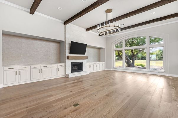 Empty room, Fireplace, Interior, Pendant Lights, Recessed Lighting, Wooden Beams, Wood Texture Flooring