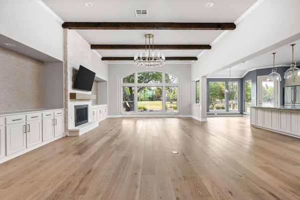 Chandelier, Empty room, Fireplace, Interior, Pendant Lights, Recessed Lighting, Wooden Beams, Wood Texture Flooring