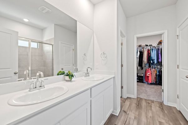 Bathroom, Dual Sink Vanities, Interior, Recessed Lighting, Walk-in Closets, Wood Texture Flooring