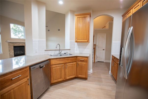 Fireplace, Interior, Kitchen, Recessed Lighting, Wood Texture Flooring
