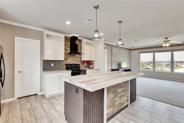 Interior, Kitchen, Pendant Lights, Recessed Lighting, Stainless Steel Appliances, Stone Walls, Wood Texture Flooring